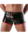 Close-up view of black and red vinyl men's shorts